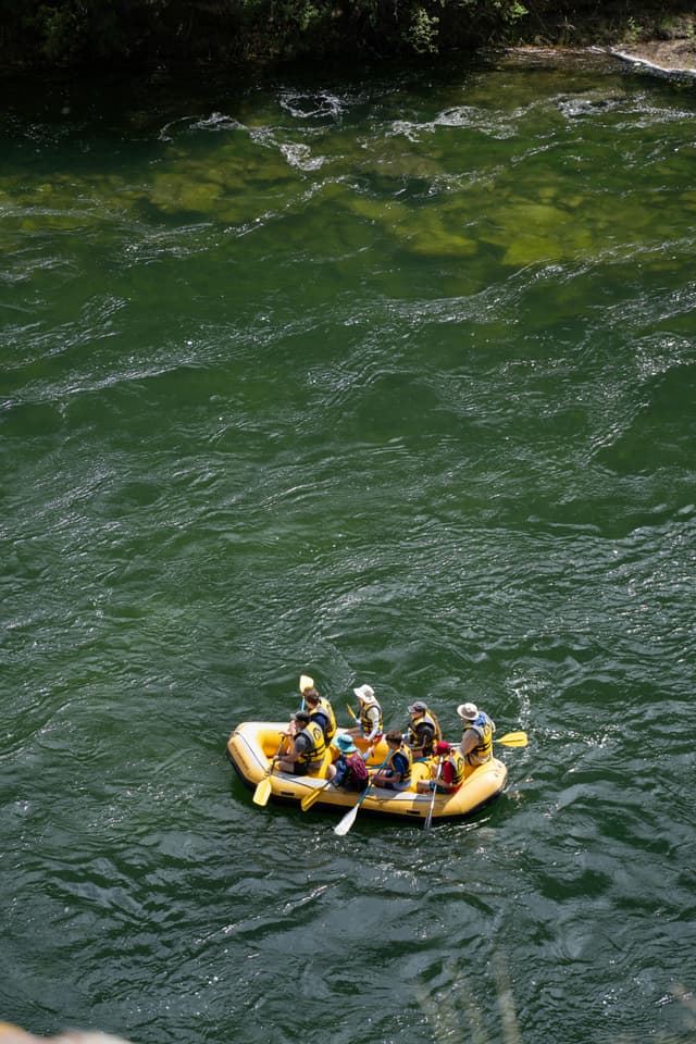 Group Rafting on a River